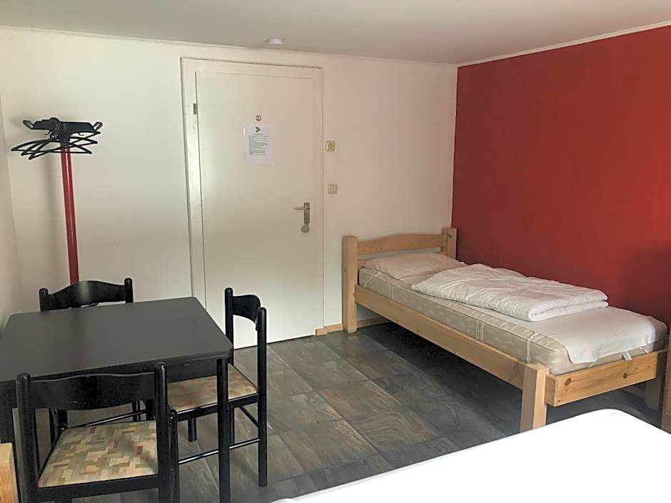 Photo 1 of 11 of Standard Twin Room with Shared Bathroom