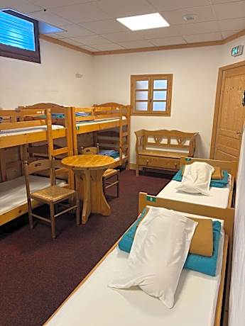 Single Bed in Dormitory Room