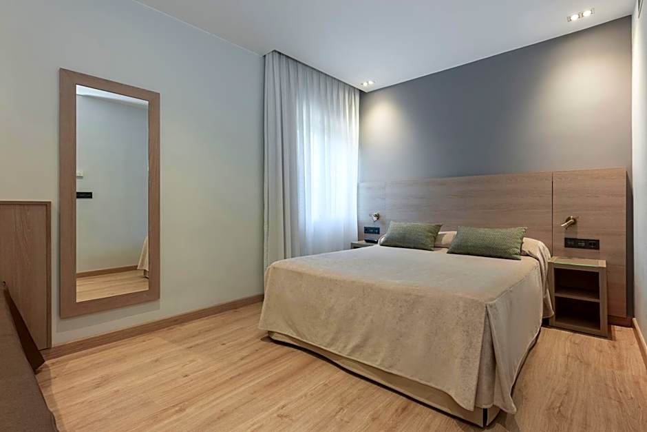 Photo 1 of 21 of Triple Room