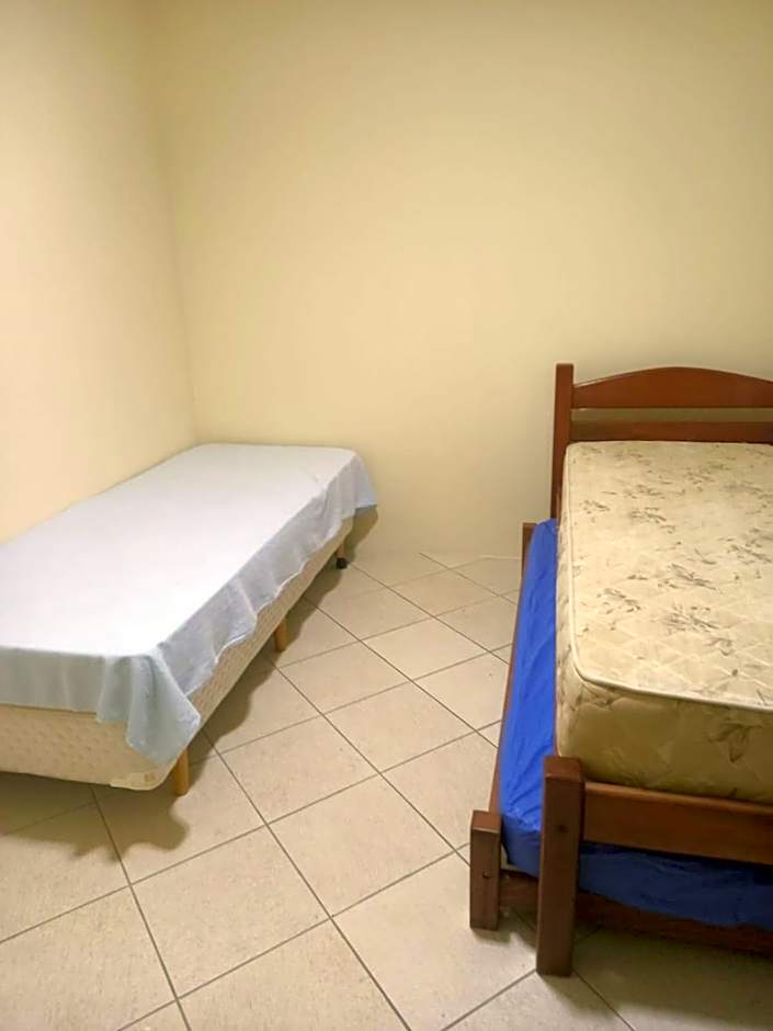 SOBRADO-BERTIOGA-Uso exclusivo para grupos de até 12 pessoas em 1 até 4 suítes