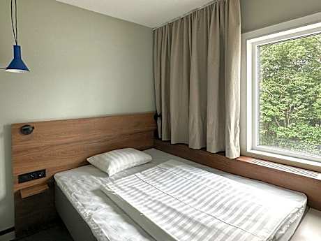 Compact Double Room (55 in bed)