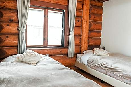 Log Hotel Twin Room 122-123 with 2 Single and 1 Sofa Bed and En-Suite