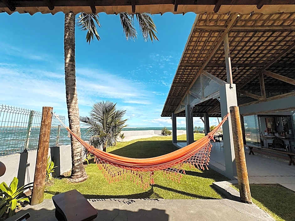 Casa Ilha| beira mar, piscina aquecida, 4 suítes