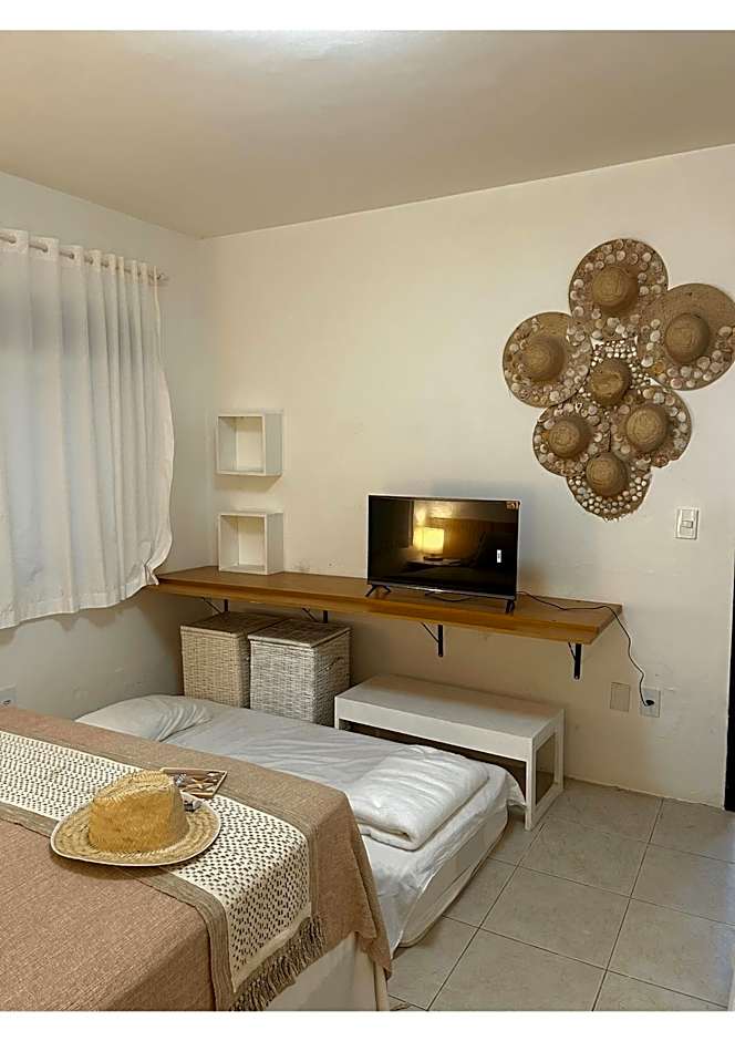 Casa Ilha| beira mar, piscina aquecida, 4 suítes