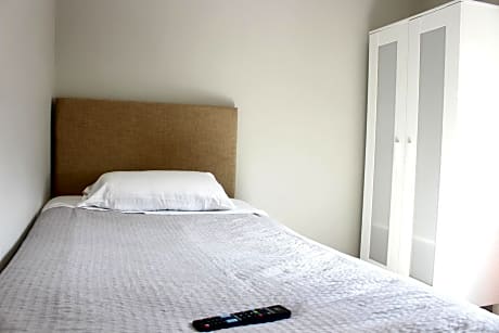 Basic Single Room with Shared Bathroom