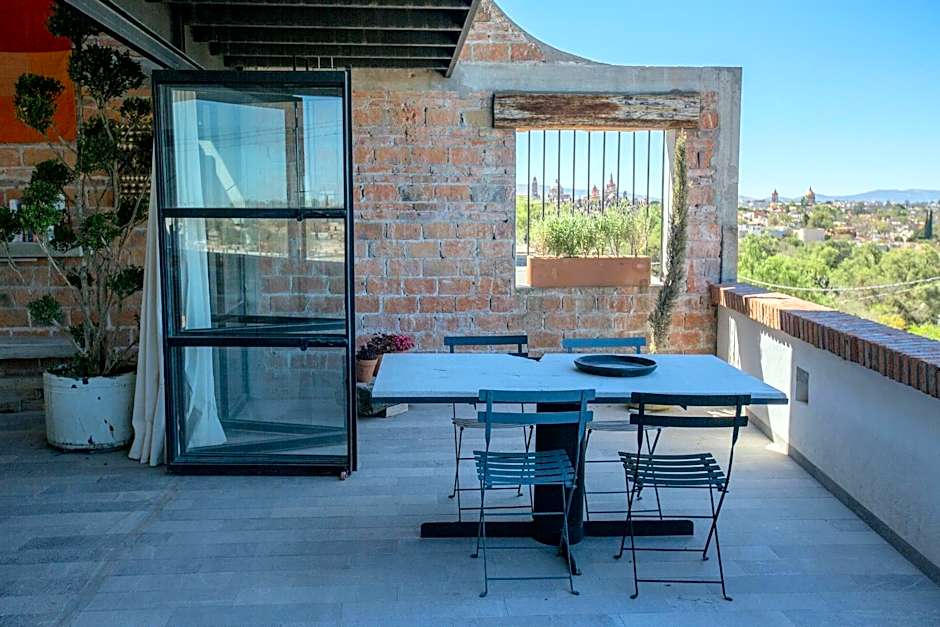 Departamento en planta baja con patio, dos habitaciones con dos ba¿os completos sala y cocina integral Vistas desde la azotea de
