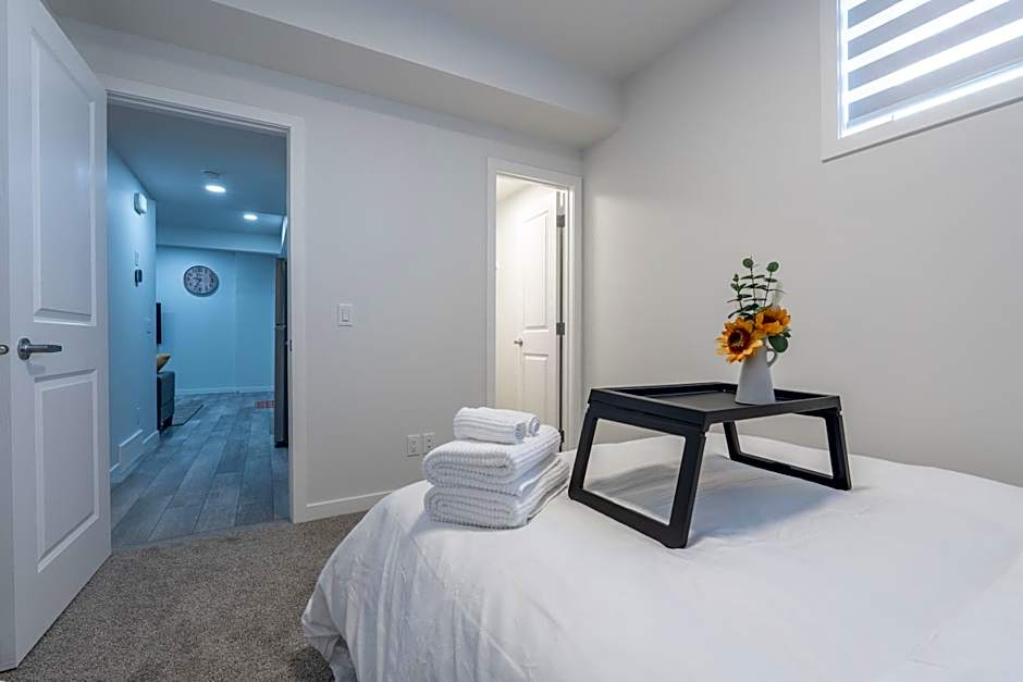 Stylish Getaway 2BD Basement by YMCA and South Health Campus Hospital