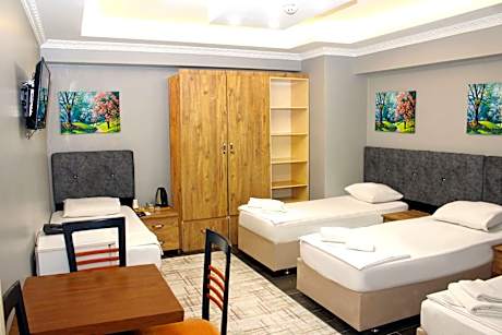 Quadruple Room with Shared Bathroom