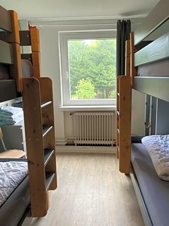 Bed in 4-Bed Mixed Dormitory Room with Shared Bathroom
