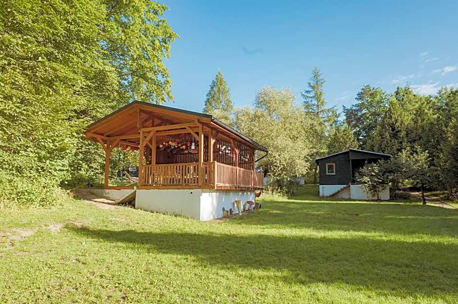 Pustelnia Supraśl - domki nad rzeką