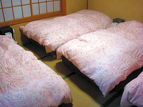 Quadruple Room with Shared Bathroom