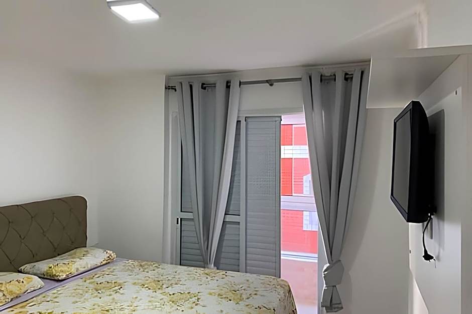 Apartamentos aconchegantes frente mar