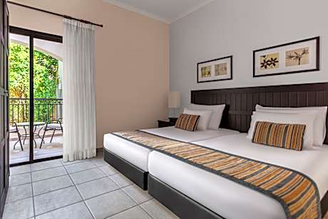 Three-Bedroom Suite, Queen and Twin Bed, Garden View QUAD