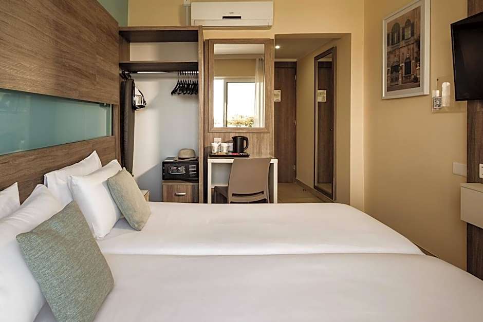 115 The Strand Hotel by NEU Collective