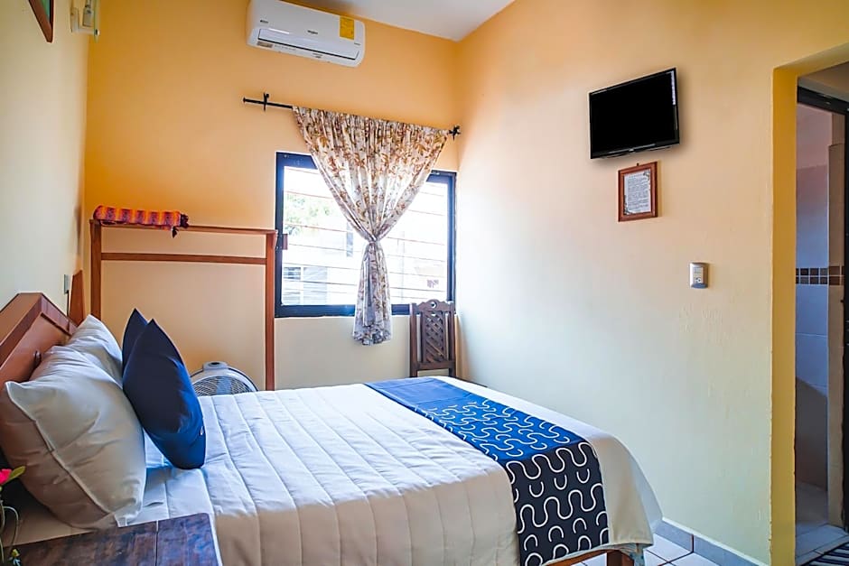 Capital O Hotel Aurora