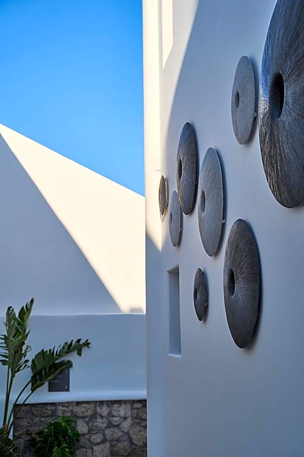 Adorno Beach Hotel and Suites