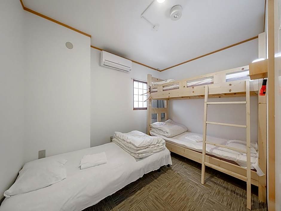 Photo 1 of 2 of Triple Room with Shared Toilet