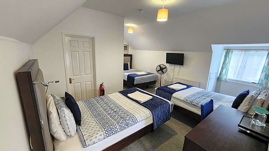 Photo 1 of 5 of Triple Room with Private Bathroom