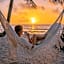 Petit Lafitte Beach Front Hotel & Bungalows