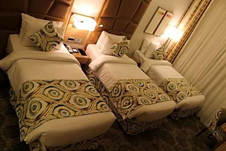 Deluxe Room with Three Single Beds