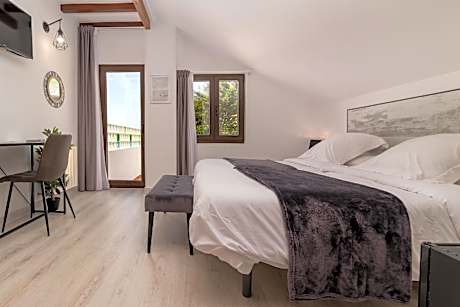 Habitacion doble con terraza ático