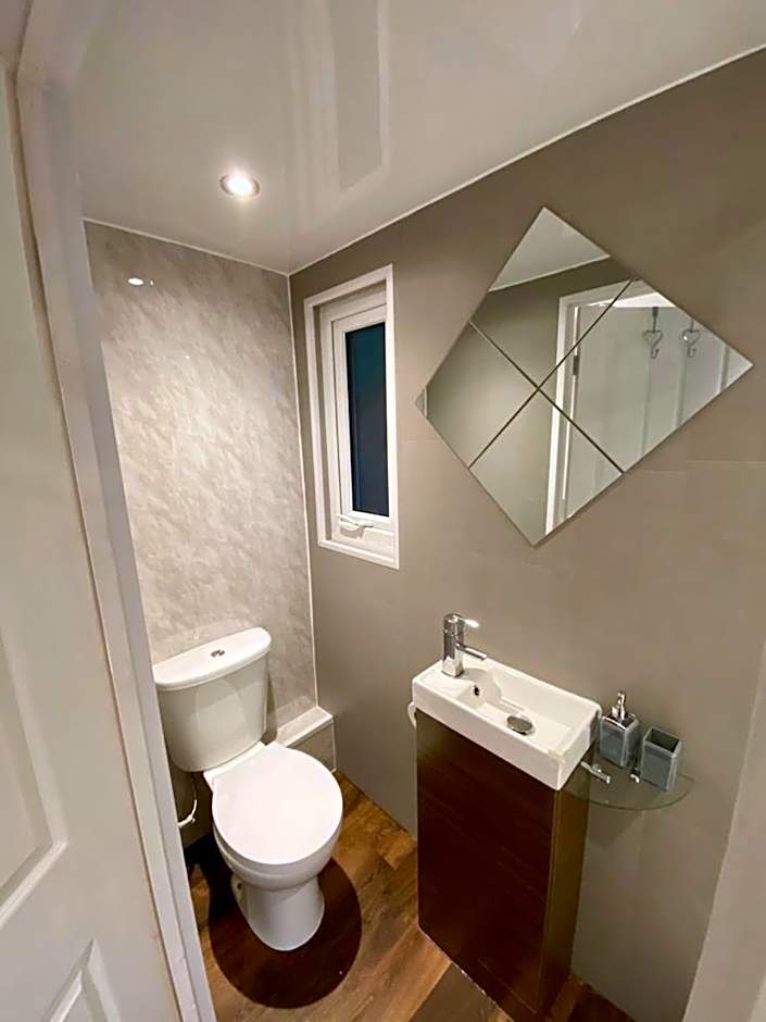 Apple tree hut, in a private garden