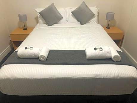 Queen Room with Shared Bathroom