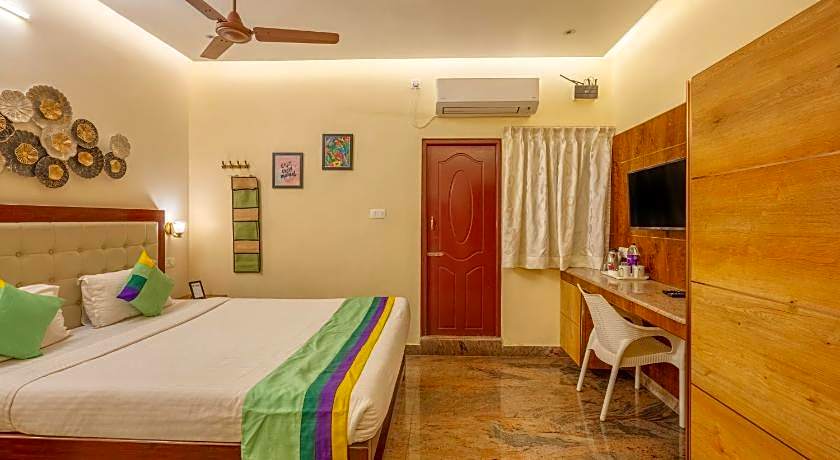 Treebo Grace Inn, 3 Min Walk From Promenade Beach