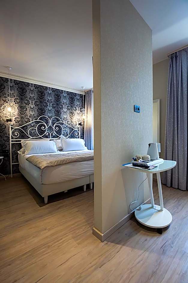 Photo 1 of 6 of Quadruple Room