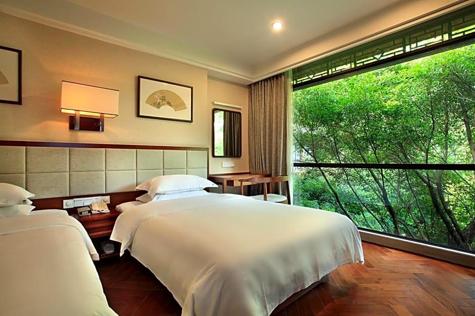 Photo 1 of 12 of Twin Room with Garden View