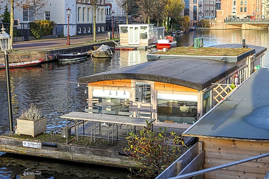 HouseBoat next to AMSTEL
