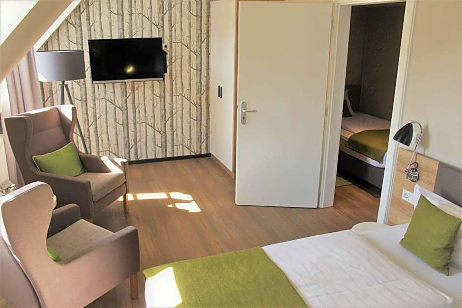 Photo 1 sur 4 de Quadruple Room