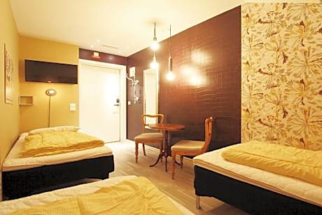 Triple Room with Shared Bathroom (No Windows)