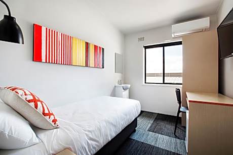 Compact Single Room with Shared Bathroom