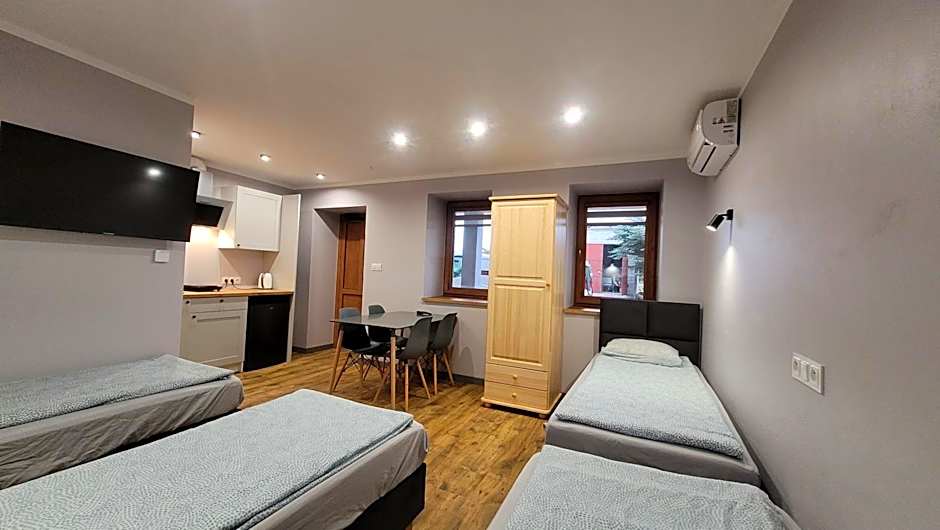 Wrzosowe Wzgórze 5 - Studia i Apartamenty