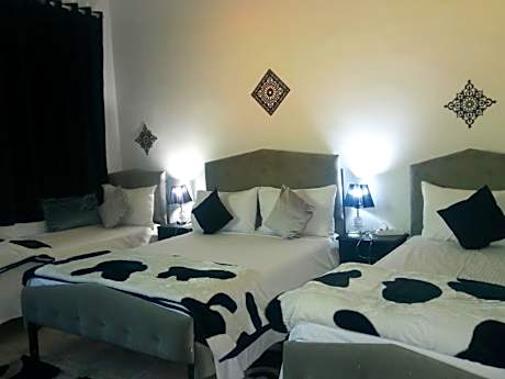 Quadruple Room with Private Bathroom