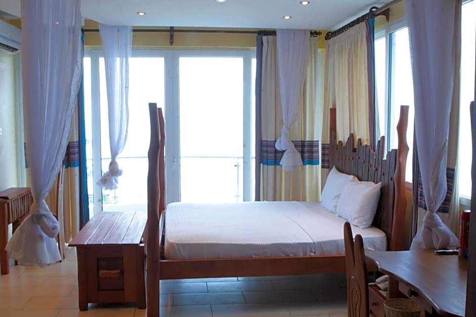 Cowrie Shell Beach Apartments Official