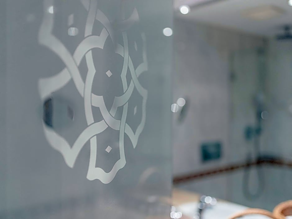 Hotel Norica - Thermenhotels Gastein mit dem Bademantel direkt in die Therme