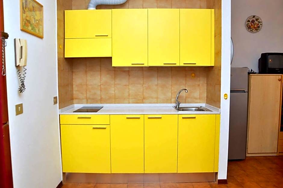 Warm two-room flat with balcony near the beach