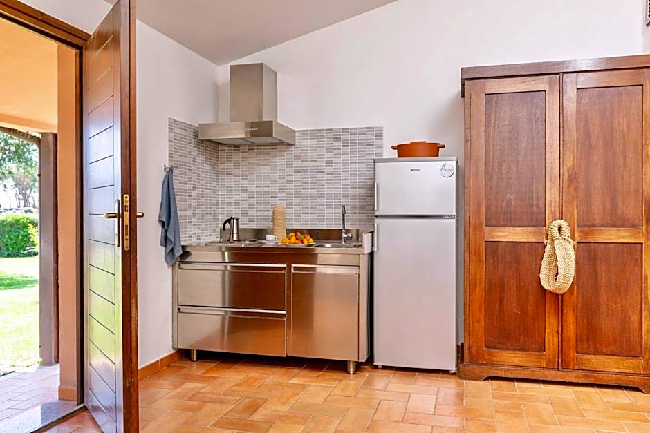 Village with swimming-pool and private equipped beach in Montalto Marina