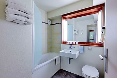 Standard Double Room with Two Single Beds and Sofa Bed
