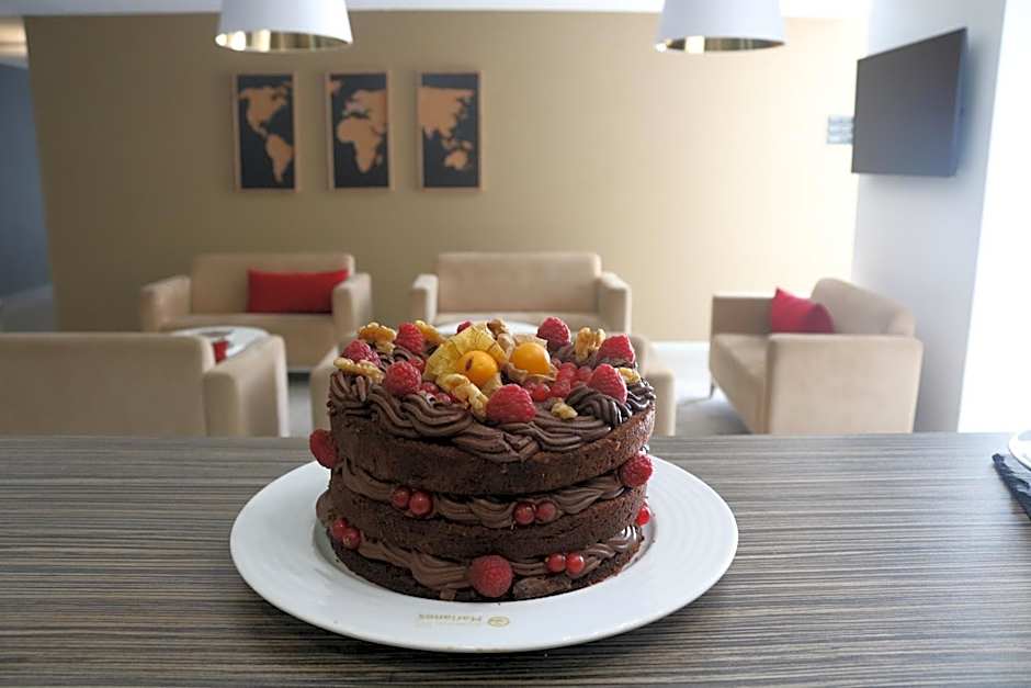 Essence Inn Marianos Hotel