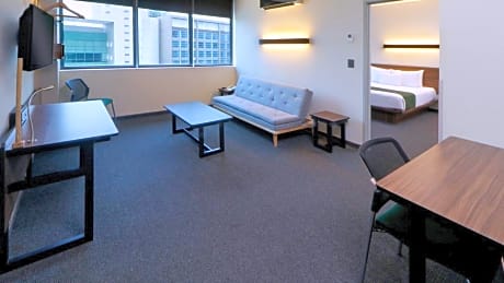2 Bedroom Suite, Bedroom 1: 1 Queen, Bedroom 2: 2 Double, Sofa Bed