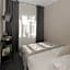 Happy Inn Rooms & Suites