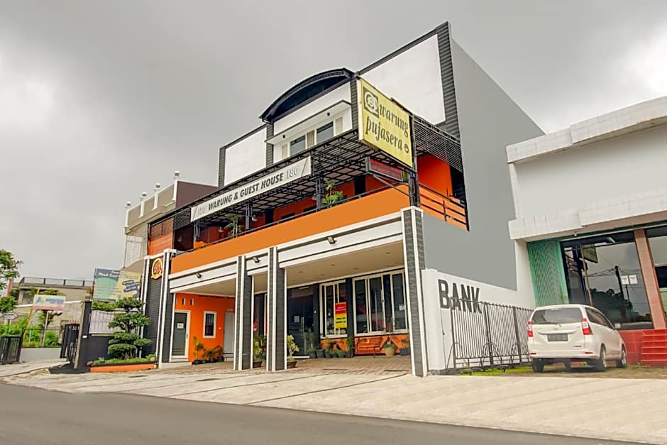 Capital O 90151 Guest House 180