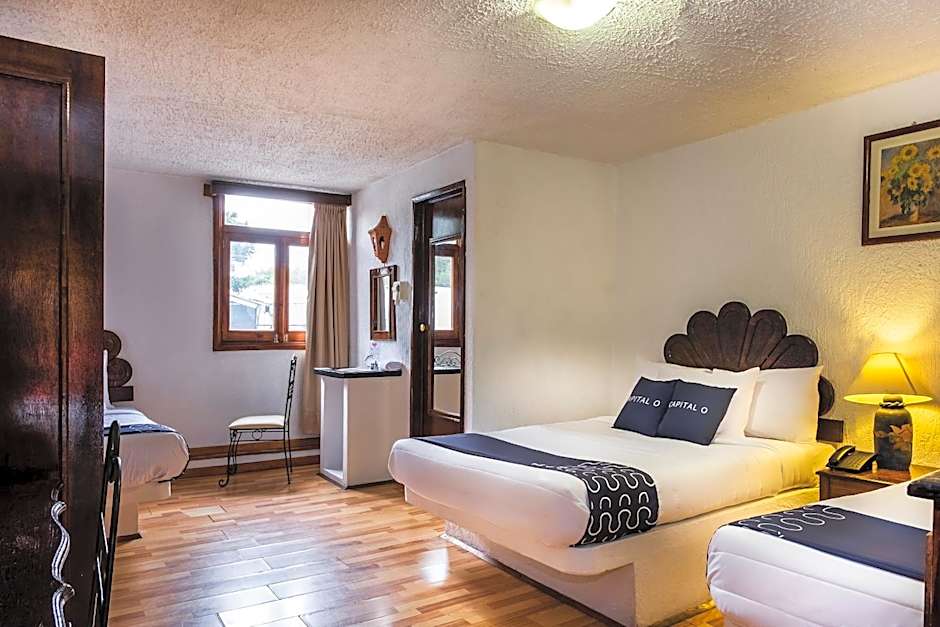 Capital O Hotel Central