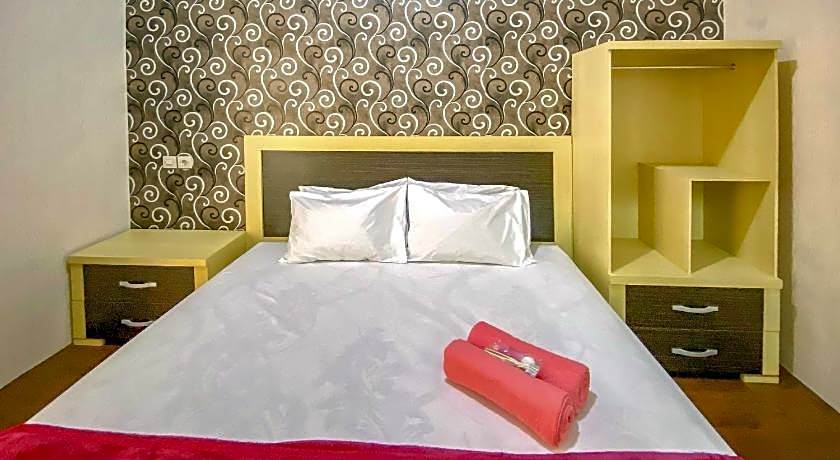 Tini's Guest House Malang Mitra RedDoorz