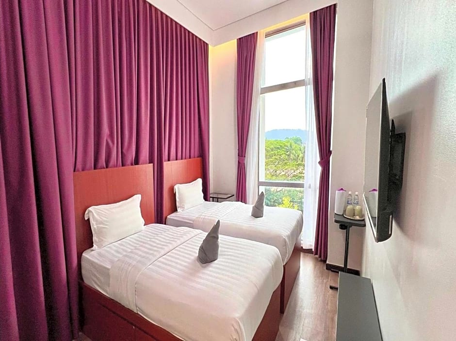 Capital O 90985 Margo Hotel KK