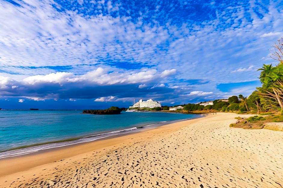 Mr.KINJO in front of Manza Beach