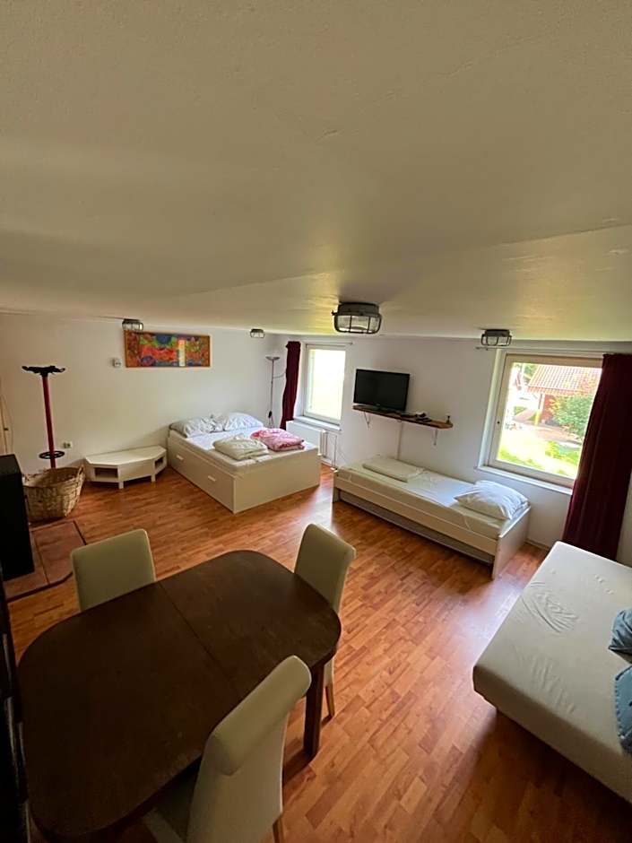 Photo 1 of 11 of Triple Room with Shared Bathroom